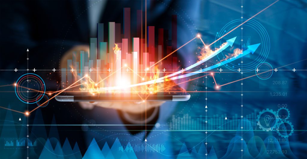 Hot business growth. Businessman using tablet analyzing sales data and economic growth graph chart. Business strategy, financial and banking. Digital marketing. 5 Ways to Take Advantage of an ERP