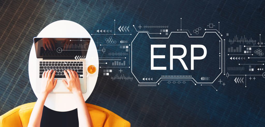 Enterprise resource planning with person using a laptop Features of an Effective ERP System