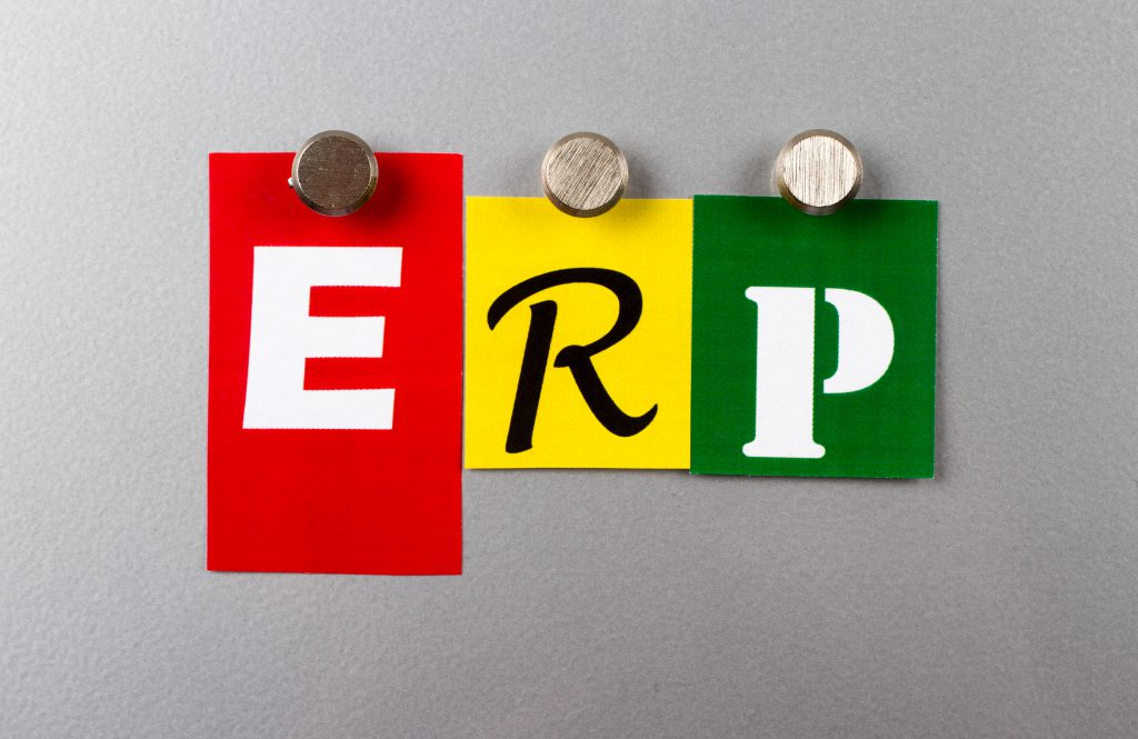 ERP pinned on a silver metal pin board 5 Things to Do While You Hold Your ERP Project