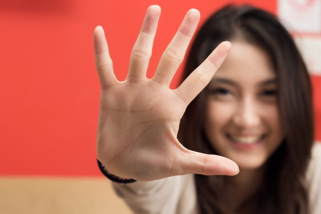 Young female hand show five fingers. Young female hand show five fingers, ERP(Enterprise Resource Planning) System in Singapore