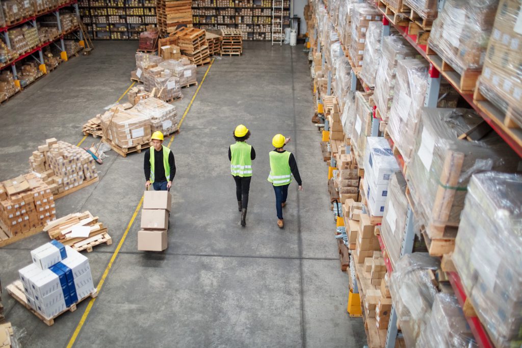 Three Workers working in large warehouse Three workers working in large warehouse, ERP(Enterprise Resource Planning) System in Singapore