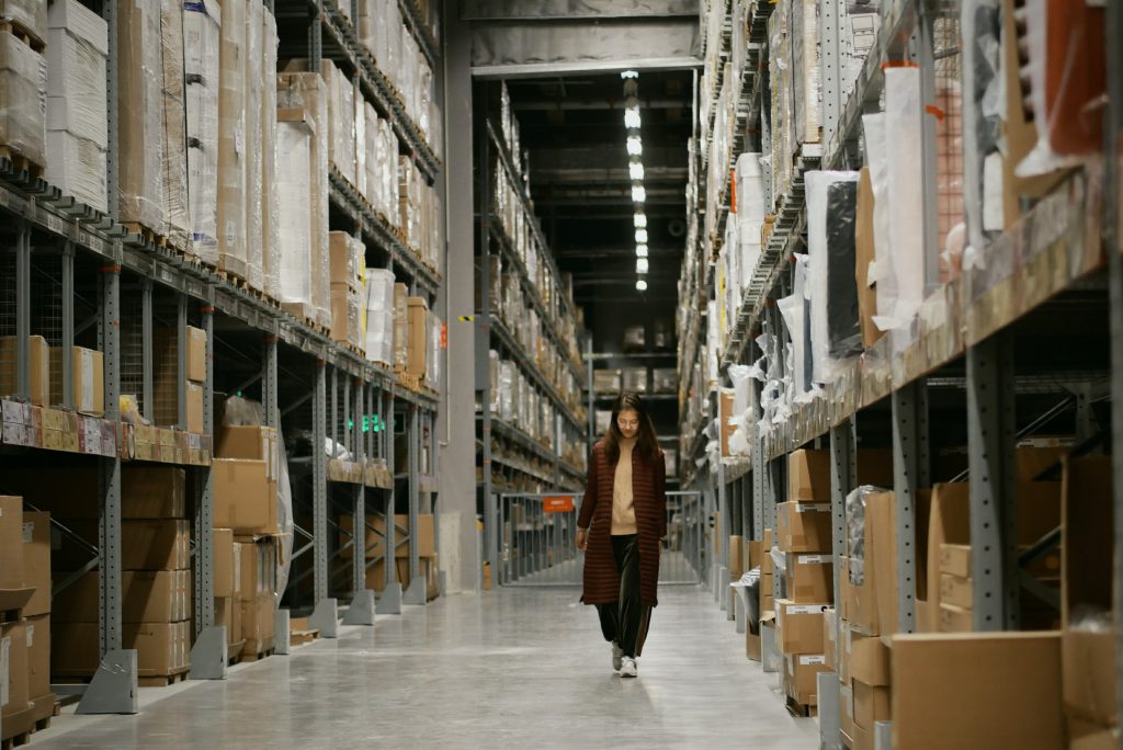 Girl walking in Warehouse, ERP(Enterprise Resource Planning) System in Singapore Girl walking in Warehouse, ERP(Enterprise Resource Planning) System in Singapore