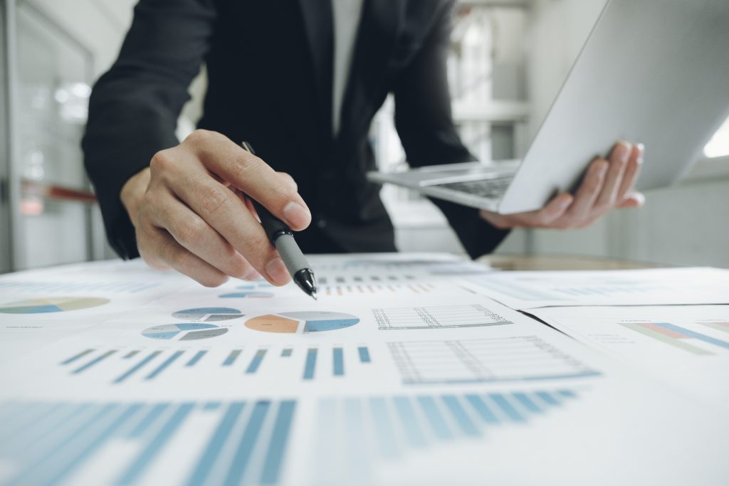 Businessman analyse data from ERP(Enterprise Resource Planning) System Businessman analyse data from ERP(Enterprise Resource Planning) System