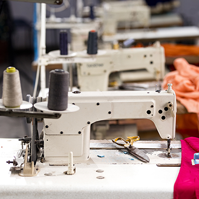 Sewing or tailoring industrial hall with machinery