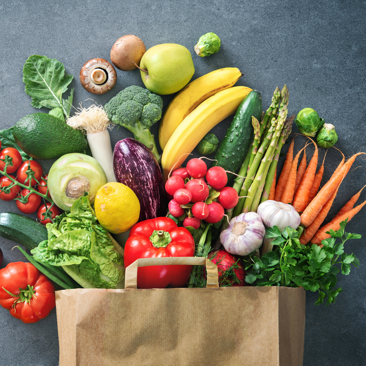 Shopping bag full of fresh vegetables and fruits