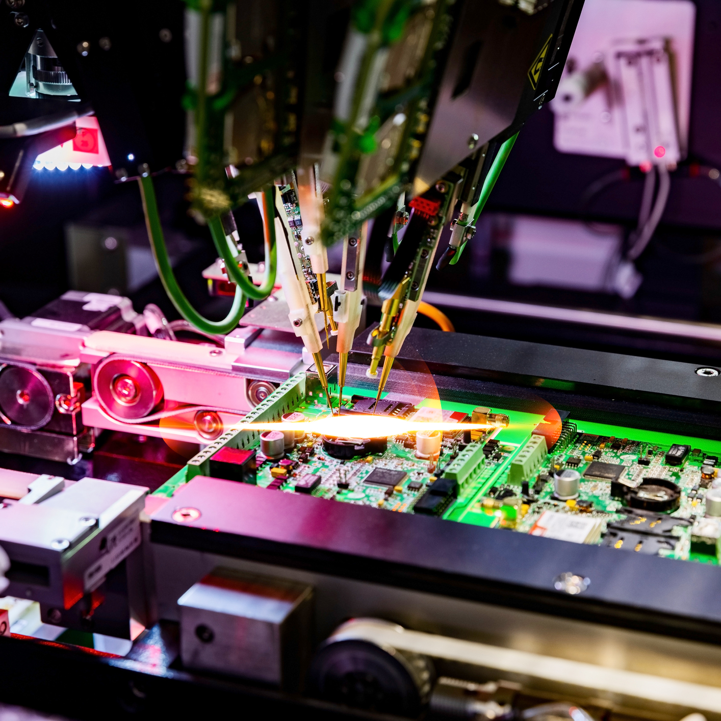 Electronic circuit board production and computer chip fly test by robotic automated machine
